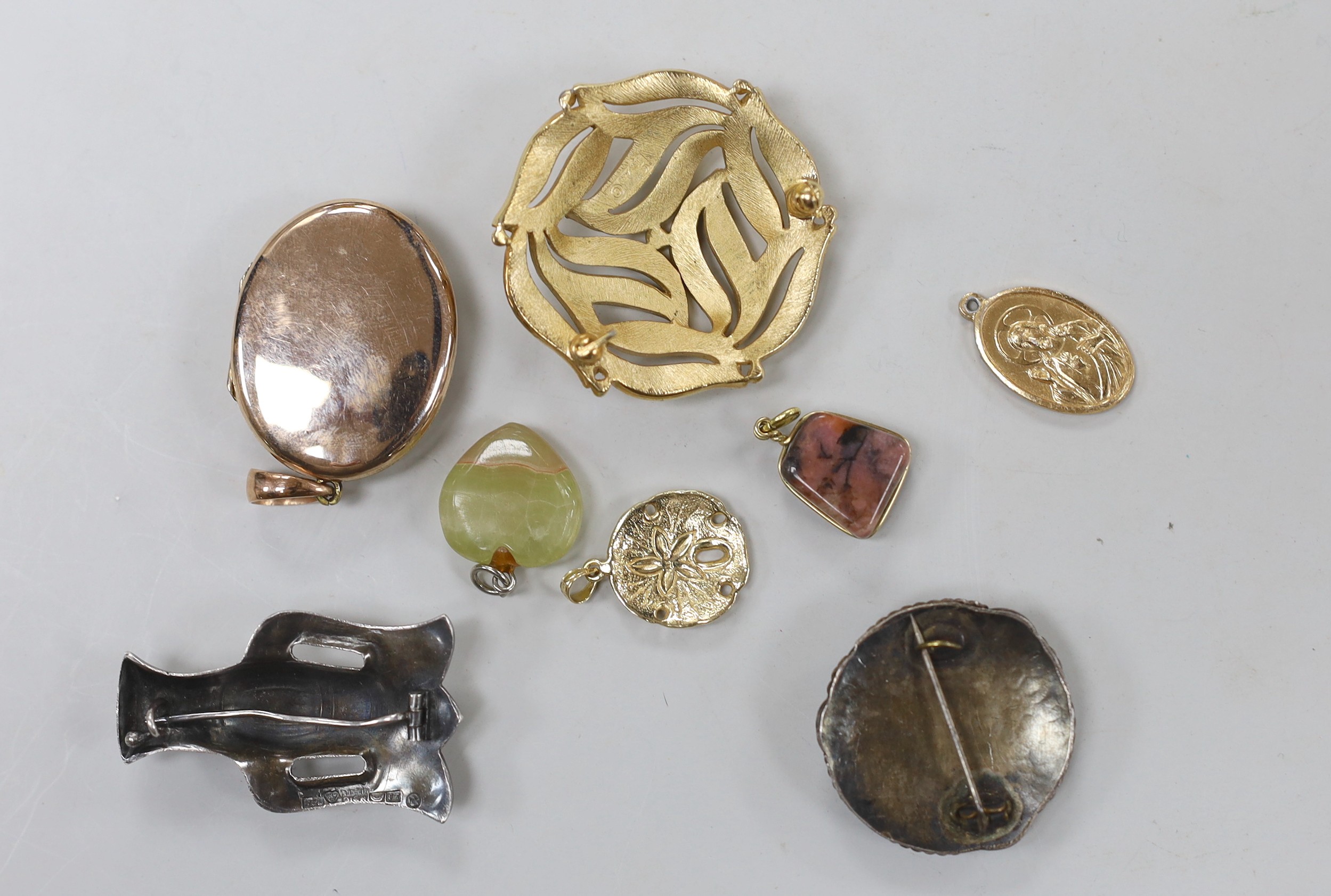 A yellow metal, ruby and seed pearl set oval locket, overall 49mm and six other items of sundry jewellery.